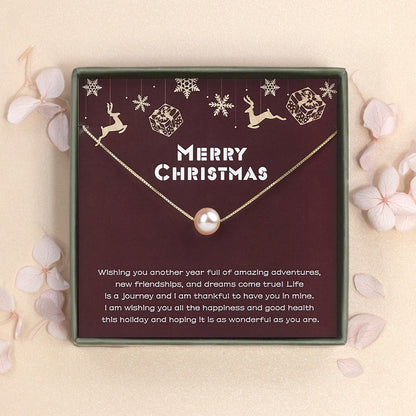 "Merry Christmas" Card and Pearl Necklace